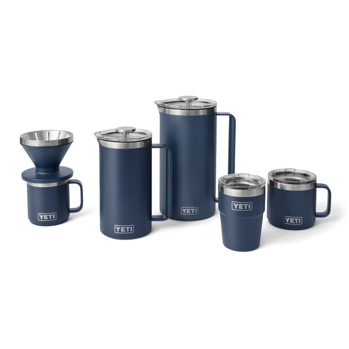 Assortment of YETI insulated  drinkware items on a white background