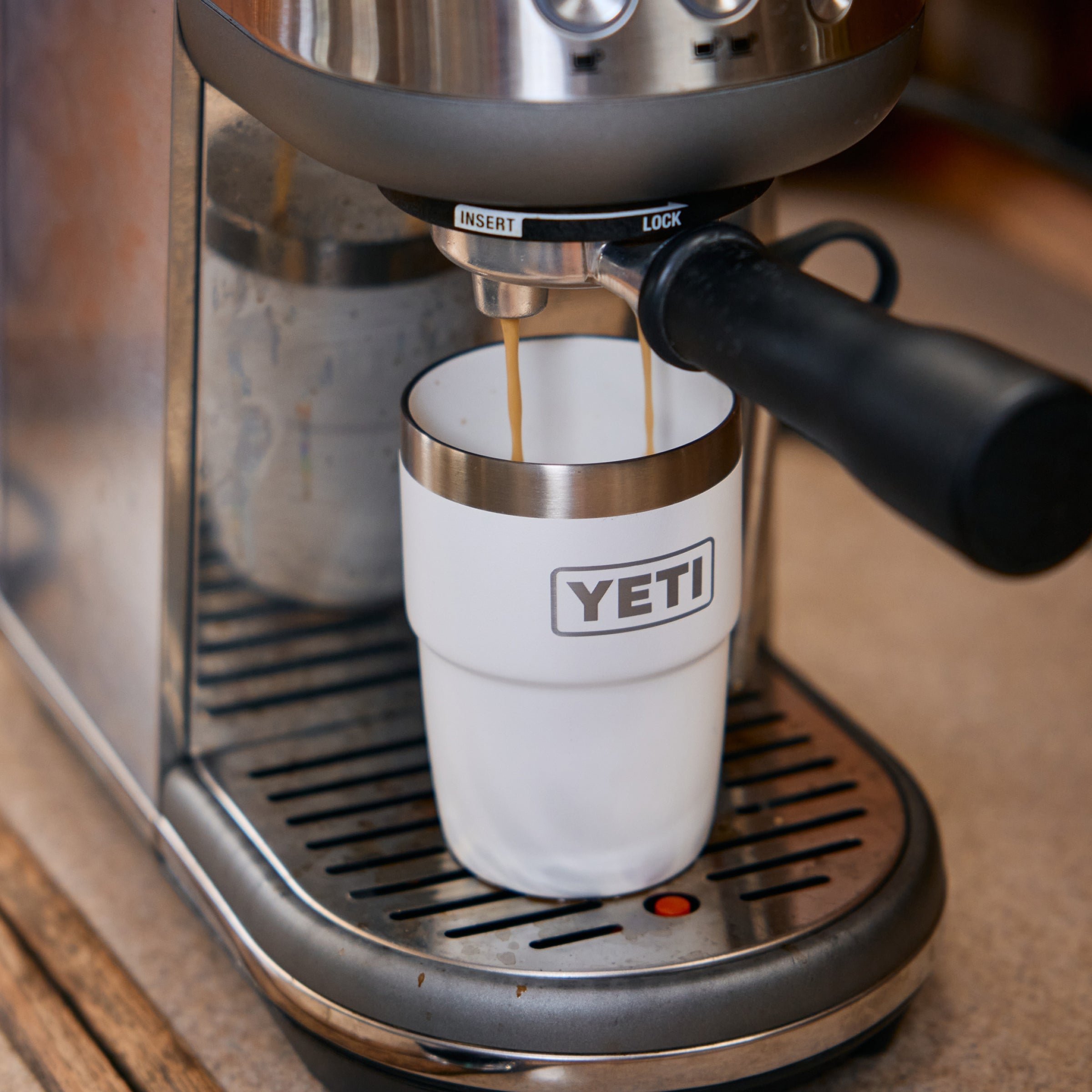 White YETI pour over and mug on a wooden surface