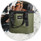 Green and black bag with a person holding it in the background