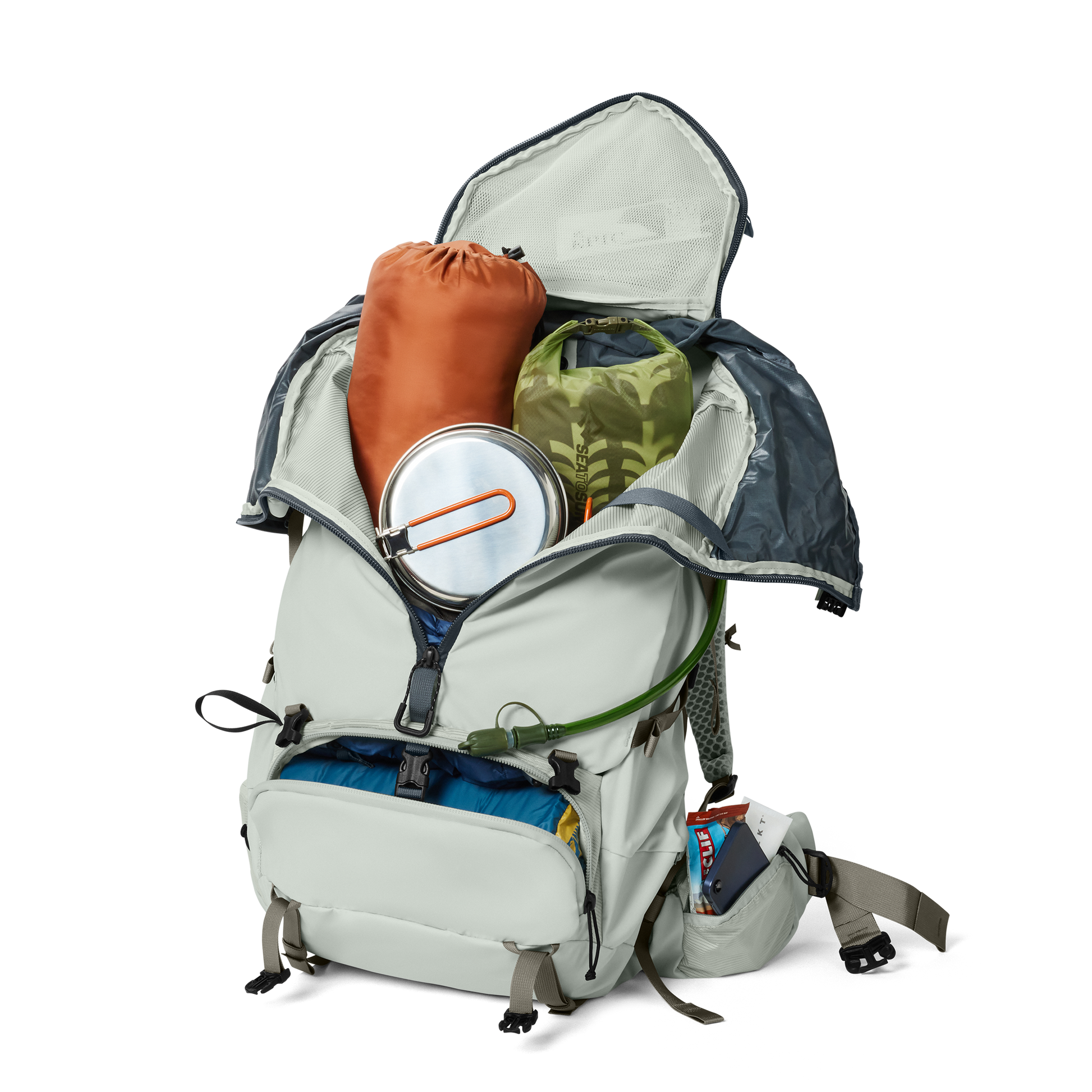 Open backpack with various items on a white background