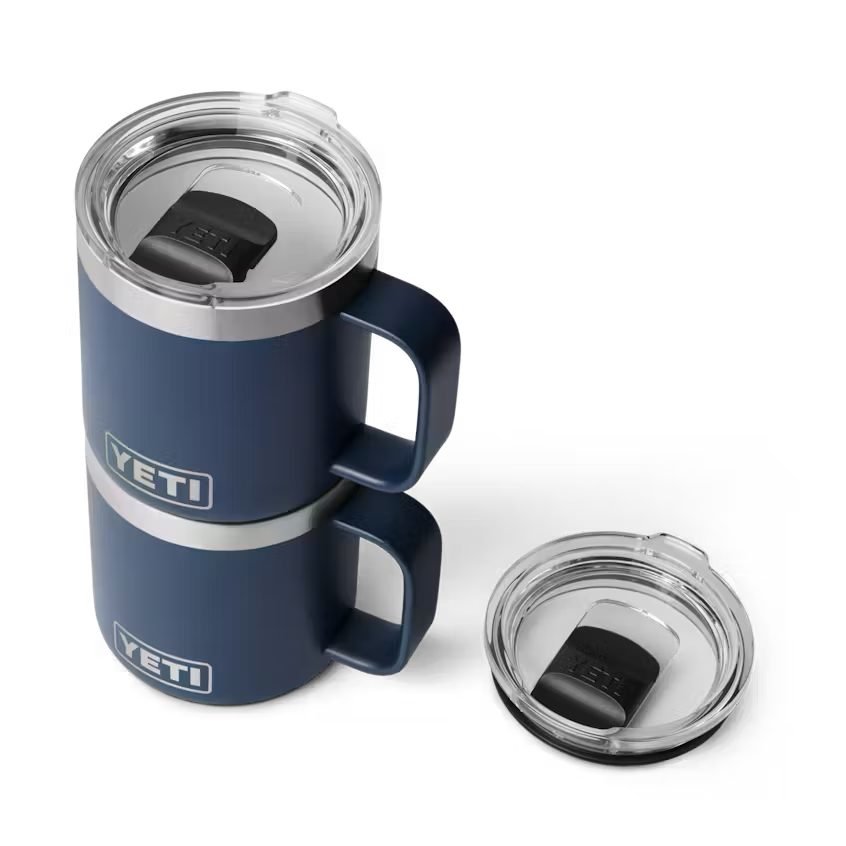 Blue YETI mug with clear lid on a white background