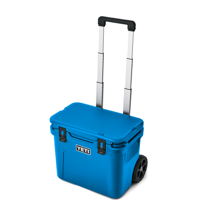 YETI Roadie® 32 Wheeled Cooler Big Wave Blue